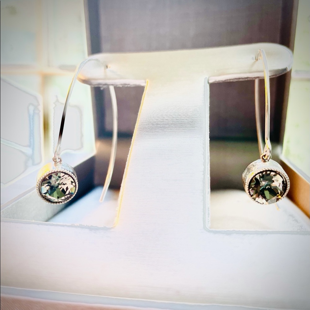 Silver tone earrings w dark-gray Swarovski stone